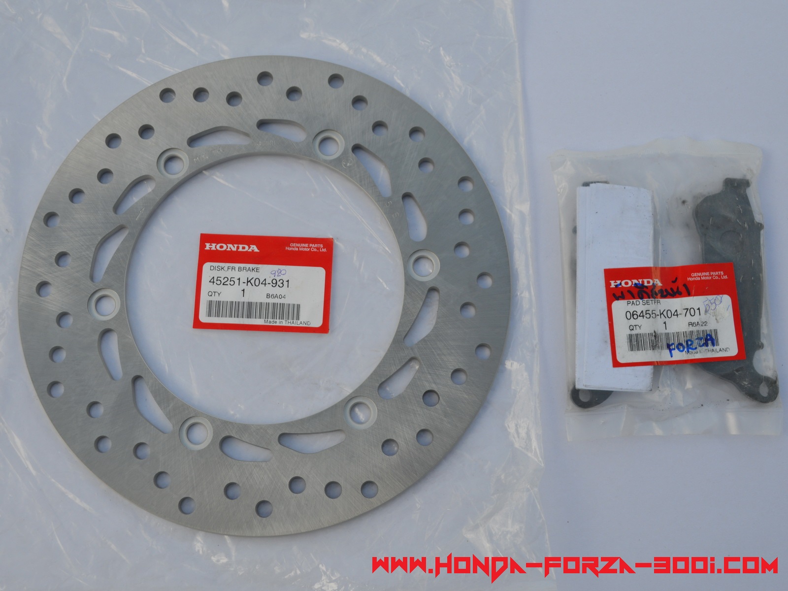 Honda Forza 300i front brake disc + brake pad pair Genuine
